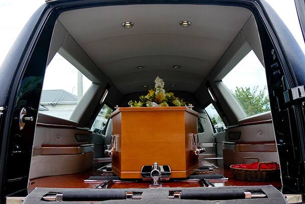 coffin inside a hearse